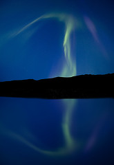 Image showing Northern Lights and reflection