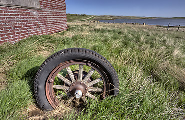 Image showing Old Wagon Wheel rubber tire