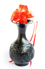 Image showing Black vase with red auspicious knot