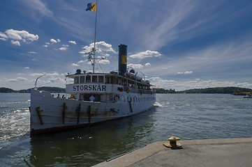 Image showing Old tourist ship Storskär approaching Vaxholm harbour