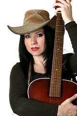 Image showing Country woman with acoustic guitar