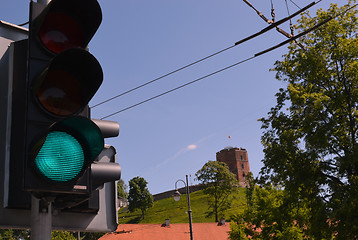 Image showing Green traffic light for tourist. Gediminas castle 