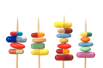 Image showing Pills on Toothpicks