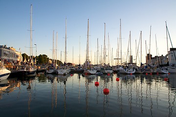 Image showing Sailboats in the sunset