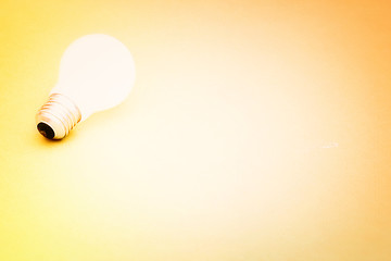 Image showing Background with lit lightbulb