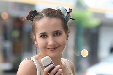 Image showing Girl with a phone