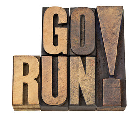 Image showing go run in letterpress wood type