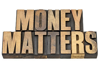 Image showing money matters in wood type