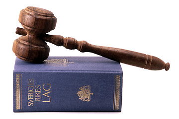 Image showing Old gavel and Swedish law book