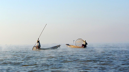 Image showing Fishermen fishing in a lake in Myanmar