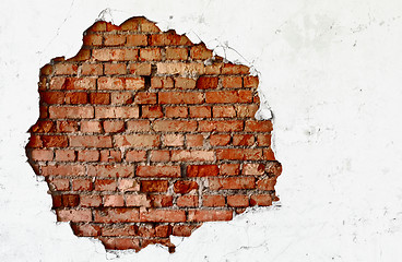 Image showing Break on the white wall - old brickwork