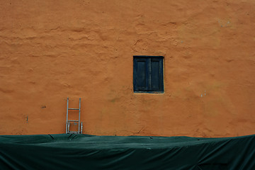 Image showing Vivid orange wall