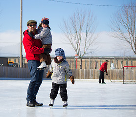 Image showing Happy family at the skating rink