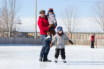 Image showing Happy family at the skating rink