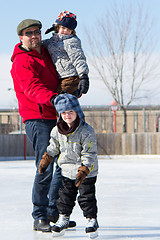 Image showing Happy family at the skating rink