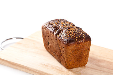 Image showing bread on the wooden board 