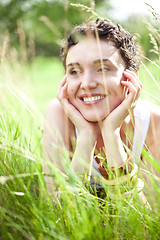 Image showing girl on green field 