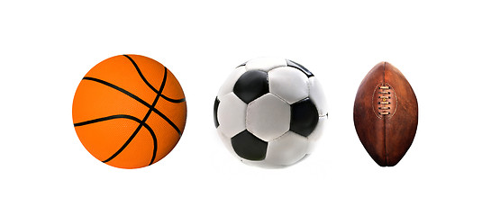 Image showing A group of sports balls on a white