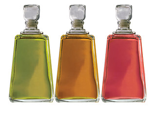 Image showing three colors perfume bottles