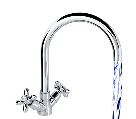 Image showing Water flowing from the faucet against