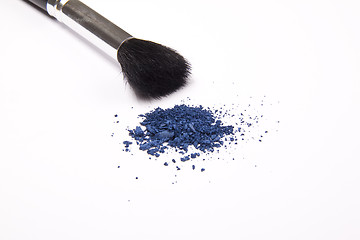 Image showing Cosmetic powder and black brush isolated