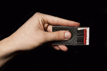 Image showing Box of matches in the man hand