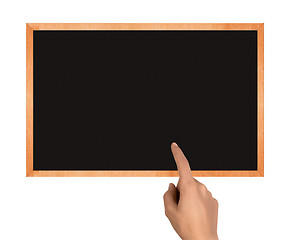 Image showing clean chalkboard with hand and copy space