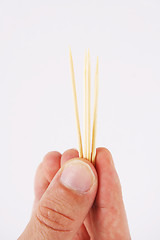 Image showing toothpicks and hand