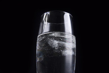 Image showing glass with ice cubes isolated