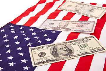 Image showing dollars on american flag