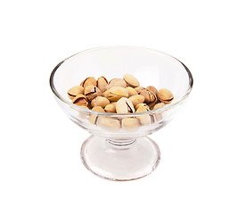 Image showing pistachio nuts in a glass bowl