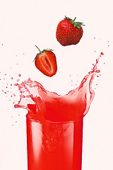 Image showing The strawberry falls in own juice