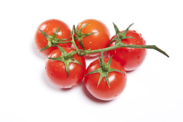 Image showing cherry tomatoes isolated on the white background