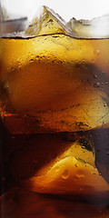 Image showing cola with ice cubes close up