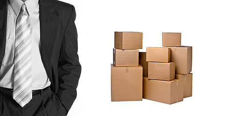 Image showing Businessman with Cardboard Boxes