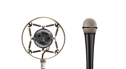 Image showing Vintage and modern microphone