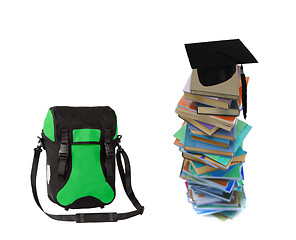 Image showing Student hat on books and bag