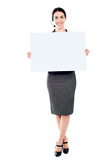 Image showing Telemarketing female with blank billboard