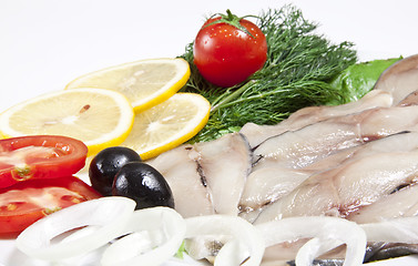 Image showing macro picture of fillet herring with vegetables