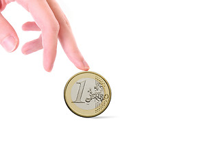 Image showing An Isolated image of Euro Coin in a hand