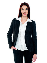 Image showing Stylish businesswoman posing with hand in pocket