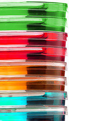 Image showing Stack of colorful Petri dishes