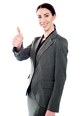 Image showing Successful business lady showing thumbs-up