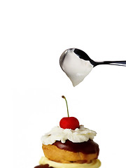 Image showing cake cherry with spoon cream