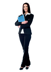 Image showing Isolated business woman holding documents