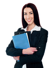 Image showing Portrait of smart smiling secretary holding file