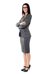 Image showing Sucessful businesswoman posing with folded arms