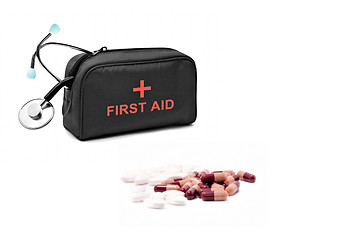 Image showing First aid kit and pills