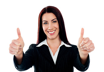 Image showing Confident businesswoman showing double thumbs-up