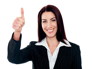 Image showing Glamorous corporate lady gesturing thumbs-up